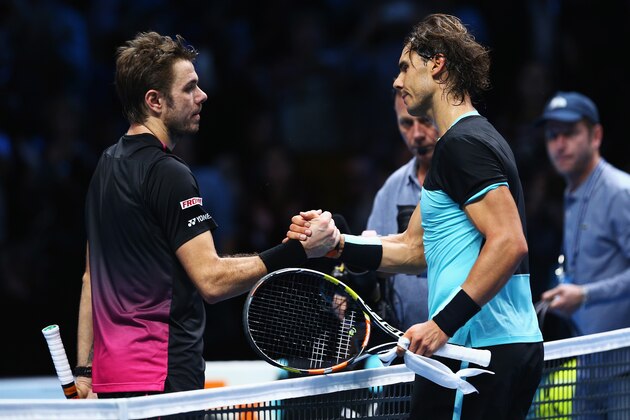 LONDON, ENGLAND - NOVEMBER 16:  Rafael Nadal of Spain shakes hands with Stanislas Wawrinka of Switzerland after their men's singles match during day two of the Barclays ATP World Tour Finals at O2 Arena on November 16, 2015 in London, England.  (Photo by Clive Brunskill/Getty Images)