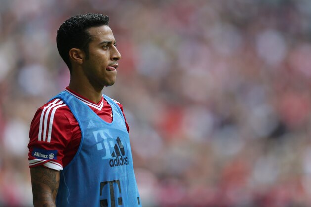 New Bayern Munich player Thiago Alcantara of Spain attends a training session after a public team presentation in the Allianz Arena stadium in Munich, southern Germany, on Tuesday, July 23, 2013. (AP Photo/Matthias Schrader)
