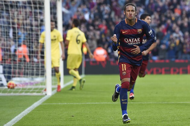 Barcelona's Brazilian forward Neymar da Silva Santos Junior celebrates his goal during the Spanish league football match FC Barcelona vs Villarreal CF at the Camp Nou stadium in Barcelona on November 8, 2015.   AFP PHOTO/ JOSEP LAGO        (Photo credit should read JOSEP LAGO/AFP/Getty Images)