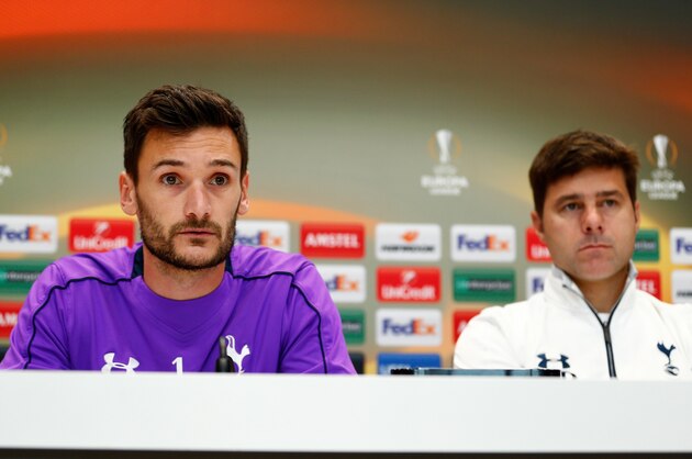 ENFIELD, ENGLAND - SEPTEMBER 16:  Tottenham Hotspur goalkeeper Hugo Lloris (L) speaks as Head Coach Mauricio Pochettino looks on during a press conference at the Tottenham Hotspur training ground on September 16, 2015 in Enfield, England.  (Photo by Harry Engels/Getty Images)