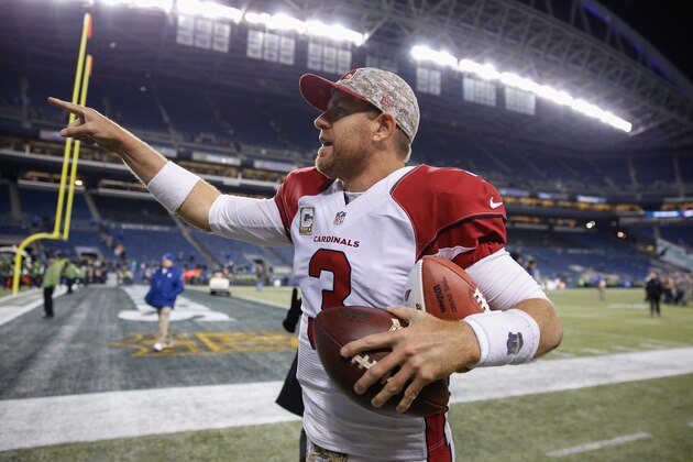 SEATTLE, WA - NOVEMBER 15:  Quarterback Carson Palmer #3 of the Arizona Cardinals heads off the field after defeating the Seattle Seahawks 39-32 at CenturyLink Field on November 15, 2015 in Seattle, Washington.  (Photo by Otto Greule Jr/Getty Images)