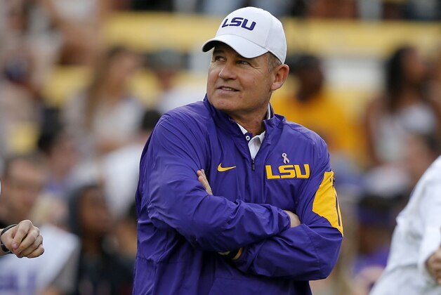 LSU head coach Les Miles watches his team warm up before an NCAA college football game against Florida in Baton Rouge, La., Saturday, Oct. 17, 2015. (AP Photo/Gerald Herbert)
