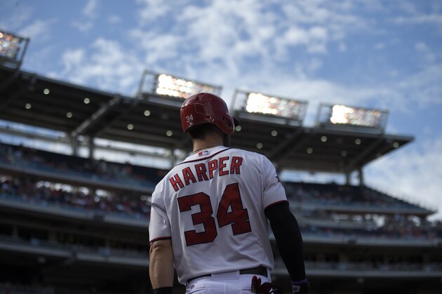 Washington Nationals' Bryce Harper (34) waits to bat during a baseball game against the Miami Marlins, Sunday, Sept. 20, 2015, in Washington. (AP Photo/Nick Wass)