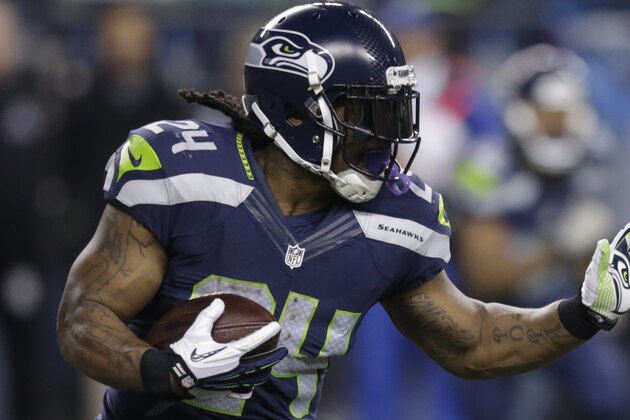 Seattle Seahawks running back Marshawn Lynch rushes against the Arizona Cardinals in the first half of an NFL football game, Sunday, Nov. 15, 2015, in Seattle. (AP Photo/Stephen Brashear)