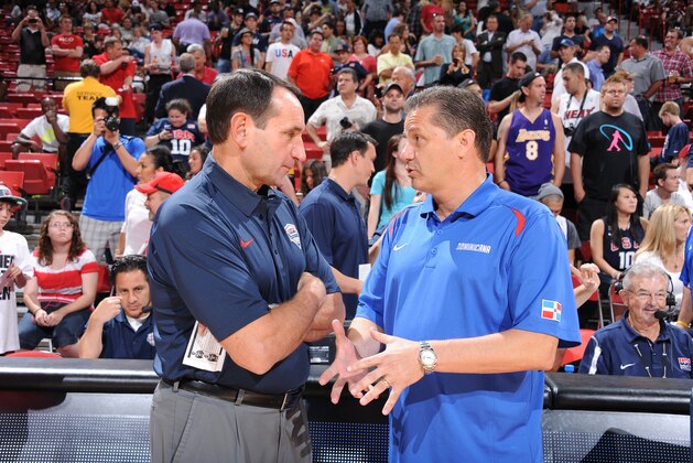 LAS VEGAS, NV - JULY 12:  Head Coach Mike Krzyzewski of the US Men's Senior National Team chats with Head Coach John Calipari of the Dominican Republic Senior Men's National Team during an exhibition game at the Thomas and Mack Center on July 12, 2012 in Las Vegas, Nevada. NOTE TO USER: User expressly acknowledges and agrees that, by downloading and/or using this Photograph, user is consenting to the terms and conditions of the Getty Images License Agreement. Mandatory Copyright Notice: Copyright 2012 NBAE (Photo by Andrew D. Bernstein/NBAE via Getty Images)