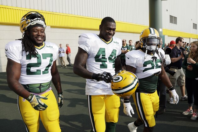 Green Bay Packers’ Eddie Lacy (27), James Starks (44) and DuJuan Harris walk on the field for NFL football training camp Monday, July 28, 2014, in Green Bay, Wis. (AP Photo/Morry Gash) Green Bay Packers’ Eddie Lacy (27), James Starks (44) and DuJuan Harris walk on the field for NFL football training camp Monday, July 28, 2014, in Green Bay, Wis. (AP Photo/Morry Gash)