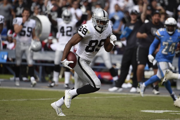 Oakland Raiders wide receiver Amari Cooper runs on his way to scoring a touchdown during the first half of an NFL football game against the San Diego Chargers Sunday, Oct. 25, 2015, in San Diego. (AP Photo/Denis Poroy)