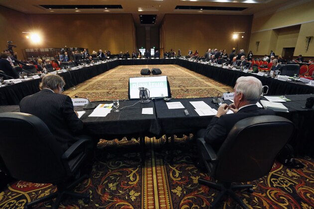 New Zealander David Howman, left, the director general of the World Anti-Doping Agency (WADA), and Craig Reedie, WADA president, prepare to begin a meeting of WADA at the Broadmoor Hotel in Colorado Springs, Wednesday, Nov. 18, 2015. Leaders from the World Anti-Doping Agency met Wednesday to decide whether to ban Russia's anti-doping operation in the wake of the report about corruption in the country's track and anti-doping programs. (AP Photo/Brennan Linsley)