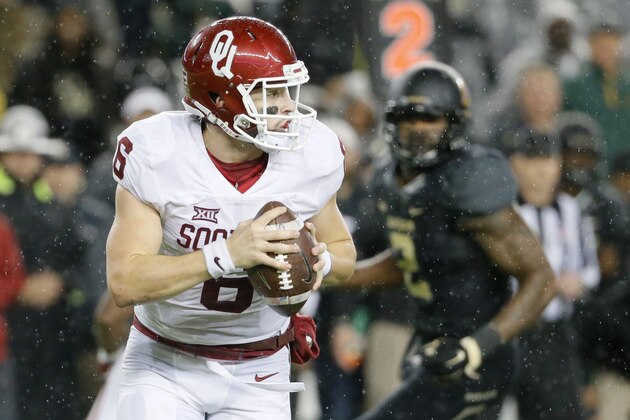 Oklahoma quarterback Baker Mayfield (6) prepares to throw a pass in the second half of an NCAA college football game against Baylor Saturday, Nov. 14, 2015, in Waco, Texas. Mayfield was 24 of 34 for 270 yards and three touchdowns and ran for a score to help Oklahoma to the 44-34 win. (AP Photo/Tony Gutierrez)