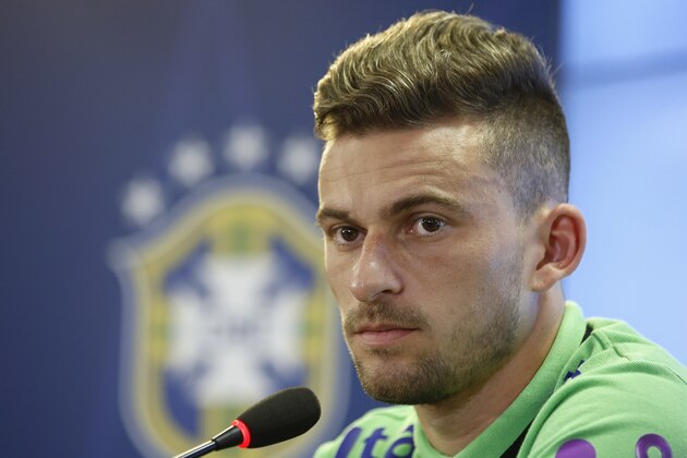 Brazil's Lucas Lima looks on during a press conference prior to a training session in Sao Paulo, Brazil, Tuesday, Nov. 10, 2015. Brazil will face Argentina in a 2018 World Cup qualifying soccer match on Nov.12 in Buenos Aires. (AP Photo/Andre Penner)