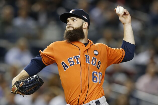 Houston Astros starting pitcher Dallas Keuchel pitches in the first inning of the American League wild card baseball game against the New York Yankees at Yankee Stadium in New York, Tuesday, Oct. 6, 2015.  (AP Photo/Kathy Willens)