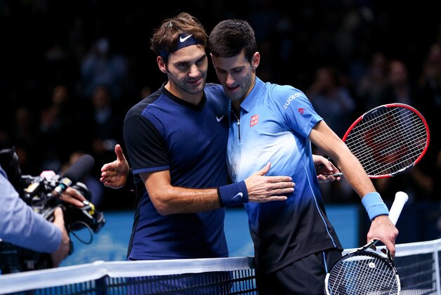 LONDON, ENGLAND - NOVEMBER 17:  Roger Federer of Switzerland (L) embraces Novak Djokovic of Serbia (R) after his straight sets victory during day three of the Barclays ATP World Tour Finals at the O2 Arena on November 17, 2015 in London, England.  (Photo by Clive Brunskill/Getty Images)