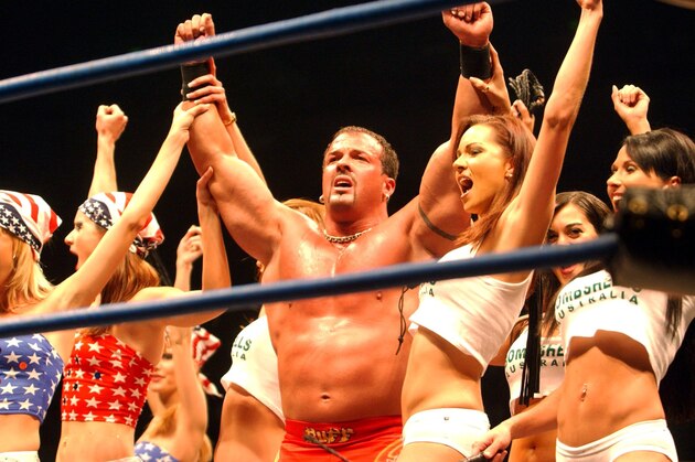 26 Oct 2001: Buff Bagwell and his girls after winning fight during the WWA Wrestling 'Inception'  fight night held at the Sydney Superdome, Sydney, Australia.  DIGITAL IMAGE Mandatory Credit: Chris McGrath/ALLSPORT