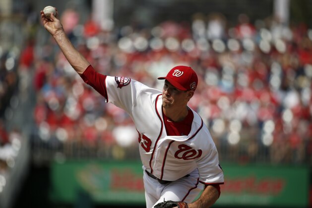 Washington Nationals relief pitcher Doug Fister (33) throws during a baseball game against the Miami Marlins at Nationals Park, Sunday, Aug. 30, 2015, in Washington.  (AP Photo/Alex Brandon)