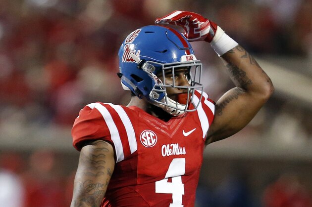 Mississippi linebacker Denzel Nkemdiche (4) tries to rally his players during the second half of an NCAA college football game against Vanderbilt, Saturday, Sept. 26, 2015, in Oxford, Miss. Mississippi won 27-16. (AP Photo/Rogelio V. Solis)