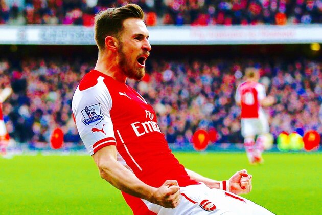 LONDON, ENGLAND - MARCH 14: Aaron Ramsey of Arsenal celebrates scoring his team's second goal during the Barclays Premier League match between Arsenal and West Ham United at Emirates Stadium on March 14, 2015 in London, England.  (Photo by Ian Walton/Getty Images)