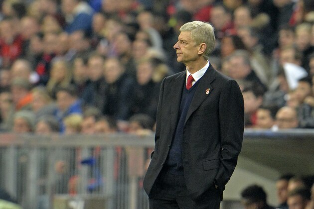 Arsenal manager Arsene Wenger watches from his coaching zone disappointed during the Champions League Group F soccer match between Bayern Munich and Arsenal FC in Munich, southern Germany, Wednesday, Nov. 4, 2015. (AP Photo/Kerstin Joensson)