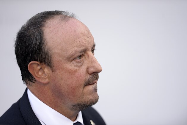 Real Madrid's coach Rafael Benitez leaves the field at the end of the Spanish league football match Celta Vigo vs Real Madrid CF at the Balaidos stadium in Vigo on October 24, 2015. Real Madrid won the match 3-1. AFP PHOTO / MIGUEL RIOPA        (Photo credit should read MIGUEL RIOPA/AFP/Getty Images)
