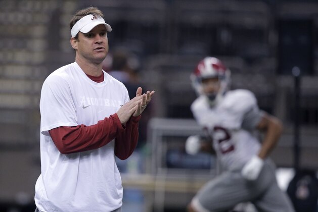 Alabama offensive coordinator Lane Kiffin runs drills during practice at the Mercedes-Benz Superdome in New Orleans, Monday, Dec. 29, 2014. They will square off against Ohio State in the Allstate Sugar Bowl NCAA football game, which will be played Jan. 1, 2015. (AP Photo/Gerald Herbert)