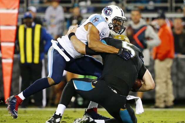 JACKSONVILLE, FL - DECEMBER 18:   Wesley Woodyard #59 of the Tennessee Titans sacks  Blake Bortles #5 of the Jacksonville Jaguars in the third quarter at EverBank Field on December 18, 2014 in Jacksonville, Florida.  (Photo by Sam Greenwood/Getty Images)