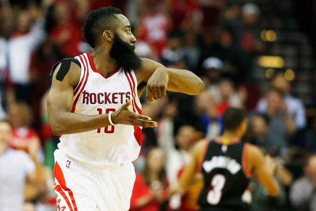 HOUSTON, TX - NOVEMBER 18:  James Harden #13 of the Houston Rockets celebrates after he hit a three-point shot near the end of the fourth quarter against the Portland Trail Blazers during their game at the Toyota Center on November 18, 2015 in Houston, Texas.  (Photo by Scott Halleran/Getty Images)