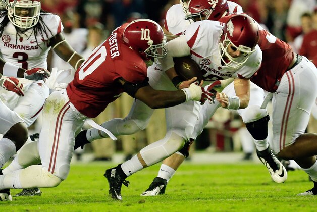 Oct 10, 2015; Tuscaloosa, AL, USA;  Alabama Crimson Tide linebacker Reuben Foster (10) prepares to hit Arkansas Razorbacks quarterback Brandon Allen (10) at Bryant-Denny Stadium. Mandatory Credit: Marvin Gentry-USA TODAY Sports