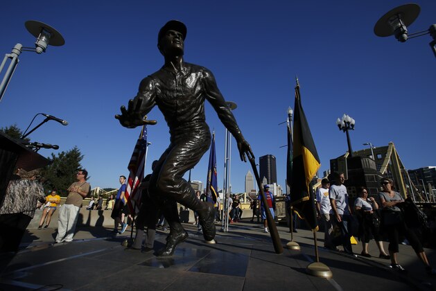 This is a statue of Pittsburgh Pirates Hall of Fame right fielder Roberto Clemente outside PNC Park in Pittsburgh, Wednesday, Sept. 16, 2015. (AP Photo/Gene J. Puskar)