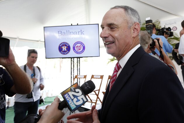 Major League Baseball commissioner Rob Manfred speaks with reporters after the groundbreaking ceremony for the future home of the of Houston Astros and the Washington Nationals spring training facility on Monday, Nov. 9, 2015, in West Palm Beach, Fla. (AP Photo/Steve Mitchell)