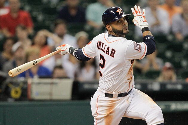 Houston Astros' Jonathan Villar (2) doubles on a ground ball to right field scoring two runs in the seventh inning of a baseball game against the Toronto Blue Jays Thursday, May 14, 2015, in Houston. (AP Photo/Bob Levey)