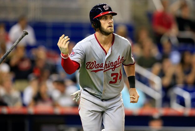 Jul 29, 2015; Miami, FL, USA;   Washington Nationals right fielder Bryce Harper (34) watches his home run in the eighth inning against the Miami Marlins at Marlins Park. Mandatory Credit: Robert Mayer-USA TODAY Sports