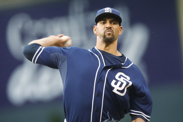 San Diego Padres starting pitcher Tyson Ross works against the Colorado Rockies in the first inning of a baseball game Friday, Aug. 14, 2015, in Denver. (AP Photo/David Zalubowski)