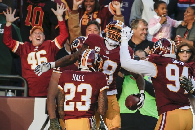 Washington Redskins free safety Dashon Goldson (38) celebrates his touchdown with teammates cornerback DeAngelo Hall (23)m and linebacker Preston Smith (94) during the second half of an NFL football game against the New Orleans Saints in Landover, Md., Sunday, Nov. 15, 2015. (AP Photo/Alex Brandon) Washington Redskins free safety Dashon Goldson (38) celebrates his touchdown with teammates cornerback DeAngelo Hall (23)m and linebacker Preston Smith (94) during the second half of an NFL football game against the New Orleans Saints in Landover, Md., Sunday, Nov. 15, 2015. (AP Photo/Alex Brandon)
