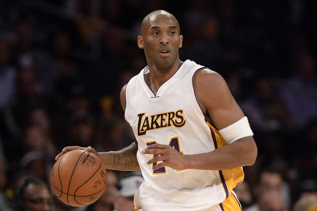 Nov 15, 2015; Los Angeles, CA, USA; Los Angeles Lakers forward Kobe Bryant (24) brings the ball up court during the second quarter against the Detroit Pistons at Staples Center. Mandatory Credit: Richard Mackson-USA TODAY Sports