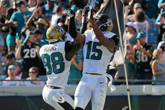 JACKSONVILLE, FL - SEPTEMBER 20: Allen Hurns #88 and Allen Robinson #15 of the Jacksonville Jaguars celebrate a touchdown during a game against the Miami Dolphins at EverBank Field on September 20, 2015 in Jacksonville, Florida.  (Photo by Mike Ehrmann/Getty Images)
