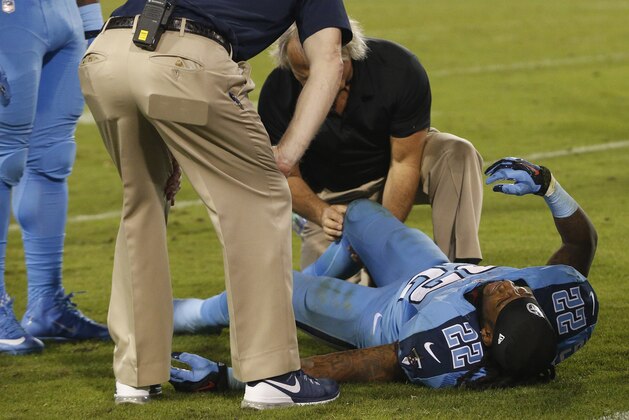 Tennessee Titans running back Dexter McCluster (22) is helped after getting hurt against the Jacksonville Jaguars during the third quarter of an NFL football game Thursday, Nov. 19, 2015, in Jacksonville, Fla. (AP Photo/Brian Blanco)