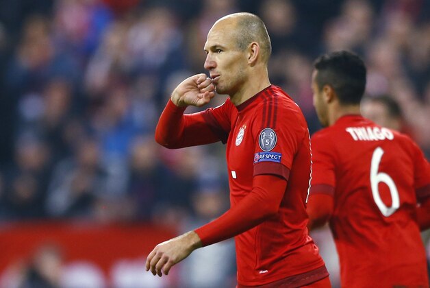 Bayern's Arjen Robben celebrates after scoring his side's fourth goal during the Champions League Group F soccer match between Bayern Munich and Arsenal FC in Munich, southern Germany, Wednesday, Nov. 4, 2015. (AP Photo/Matthias Schrader)