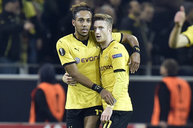 Dortmund's second scorer Pierre-Emerick Aubameyang, left, celebrates his goal with first scorer  Marco Reus, right, during the Europa League group C soccer match between Borussia Dortmund and Qabala FC in Dortmund, Germany, Thursday, Nov. 5, 2015. (AP Photo/Martin Meissner)