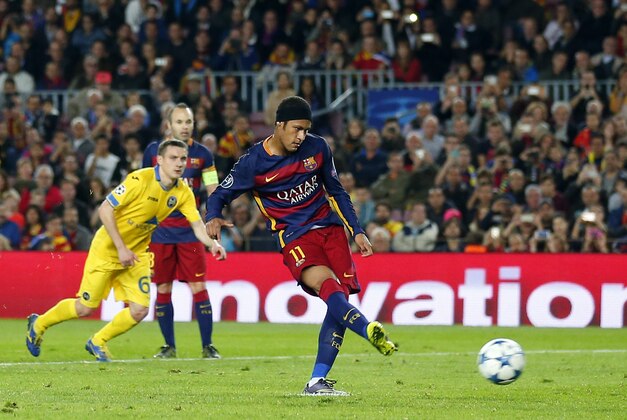 Barcelona's Neymar scores the opening goal from the penalty spot during the Champions League Group E soccer match between FC Barcelona and BATE Borisov at the Camp Nou stadium in Barcelona, Spain, Wednesday, Nov. 4, 2015. (AP Photo/Manu Fernandez)