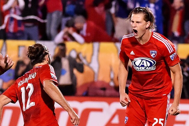 Nov 8, 2015; Dallas, TX, USA;  FC Dallas defender Walker Zimmerman (25) celebrates with teammates after kicking the game winning goal past Seattle Sounders FC goalkeeper Stefan Frei (not pictured) to defeat Seattle Sounders FC 4-2 during the penalty kicks in the MLS Playoffs at Toyota Stadium. FC Dallas. Mandatory Credit: Jasen Vinlove-USA TODAY Sports