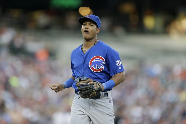 Chicago Cubs shortstop Starlin Castro runs to the dugout during the third inning of a baseball game against the Detroit Tigers, Wednesday, June 10, 2015, in Detroit. (AP Photo/Carlos Osorio)