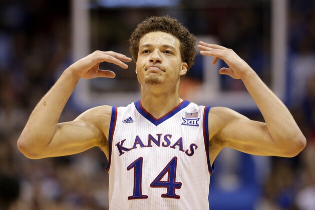 Kansas' Brannen Greene celebrates after making a shot during the second half of an NCAA college basketball game against Northern Colorado Friday, Nov. 13, 2015, in Lawrence, Kan. Kansas won 109-72. (AP Photo/Charlie Riedel)