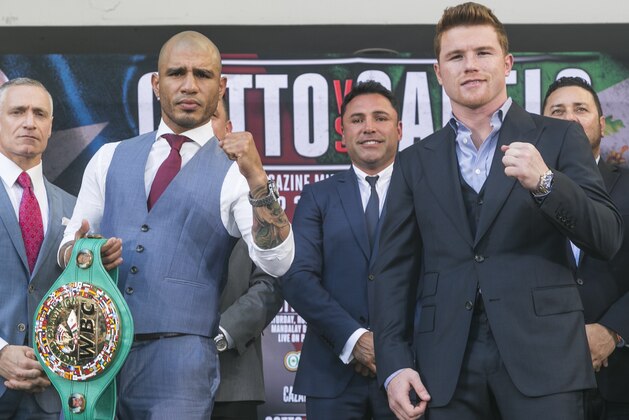 Boxers Miguel Cotto, from Puerto Rico, second from left, WBC, Ring Magazine and Lineal Middleweight World Champion and Saul