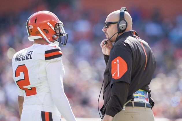 CLEVELAND, OH - SEPTEMBER 20: Quarterback Johnny Manziel #2 of the Cleveland Browns talks to head coach Mike Pettine during the first half against the Tennessee Titans at FirstEnergy Stadium on September 20, 2015 in Cleveland, Ohio. (Photo by Jason Miller/Getty Images)