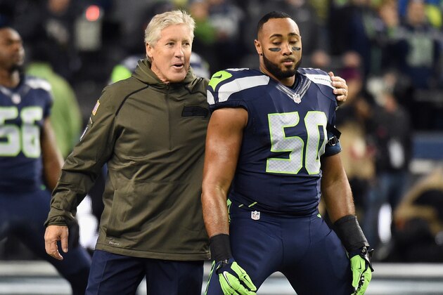 SEATTLE, WA - NOVEMBER 15:  Head coach Pete Carroll of the Seattle Seahawks greets K.J. Wright #50 of the Seattle Seahawks prior to the game between the Seattle Seahawks and the Arizona Cardinals at CenturyLink Field on November 15, 2015 in Seattle, Washington.  (Photo by Steve Dykes/Getty Images)