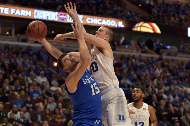 CHICAGO, IL - NOVEMBER 17: Marshall Plumlee #40 of the Duke Blue Devils fights for the ball against Isaac Humphries #15 of the Kentucky Wildcats during the State Farm Champions Classic at the United Center on November 17, 2015 in Chicago, Illinois. Kentucky defeated Duke 74-63. (Photo by Lance King/Getty Images)