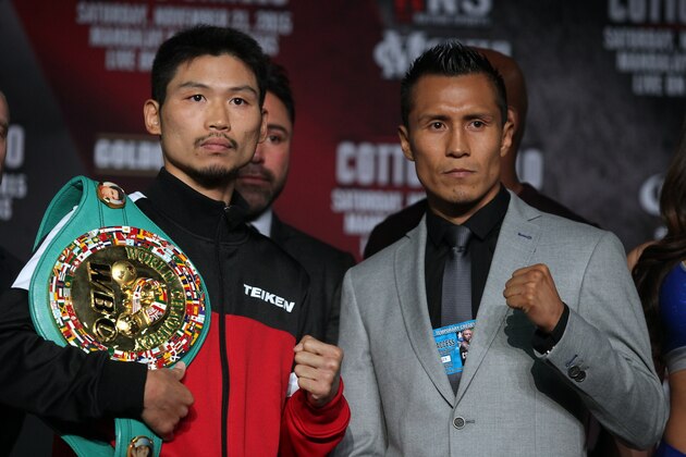 Francisco Vargas, from Mexico (R) and  Takashi Miura, of Japan pose for a photo during a press conference in Las Vegas, Nevada on November 19, 2015. Miura will defend his WBC Super Featherweight title for the fifth time against Vargas Saturday November 21, 2015 at the Mandalay Bay Events Center. AFP PHOTO/ JOHN GURZINSKI        (Photo credit should read JOHN GURZINSKI/AFP/Getty Images)