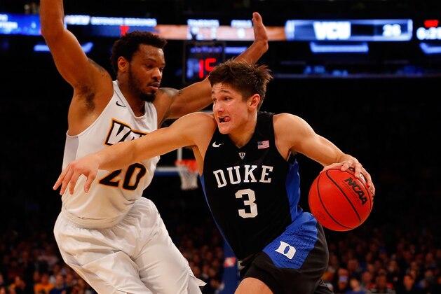 NEW YORK, NY - NOVEMBER 20:  Grayson Allen #3 of the Duke Blue Devils drives to the hoop in the first half against Jordan Burgess #20 of the Virginia Commonwealth Rams during the 2K Classic at Madison Square Garden on November 20, 2015 in New York City.  (Photo by Jim McIsaac/Getty Images)