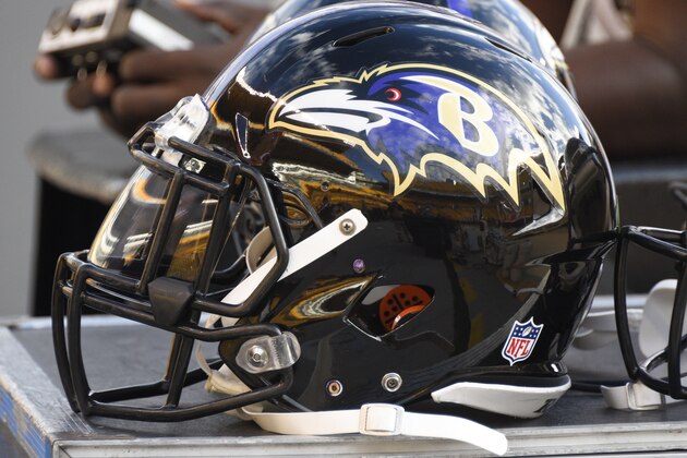 A pair of Baltimore Ravens helmets are on a bench on the sideline  before an NFL football game against the Pittsburgh Steelers Thursday, Oct. 1, 2015 in Pittsburgh. (AP Photo/Don Wright)
