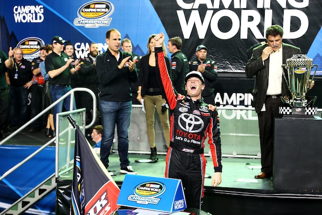 HOMESTEAD, FL - NOVEMBER 20:  Erik Jones, driver of the #4 Toyota, celebrates in victory lane after winning the series championship during the NASCAR Camping World Truck Series Ford EcoBoost 200 at Homestead-Miami Speedway on November 20, 2015 in Homestead, Florida.  (Photo by Sarah Crabill/Getty Images)