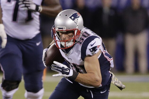 New England Patriots' Danny Amendola (80) runs with the ball against the New York Giants during the second half of an NFL football game Sunday Nov. 15, 2015, in East Rutherford, N.J. The Patriots won 27-26. (AP Photo/Julie Jacobson)